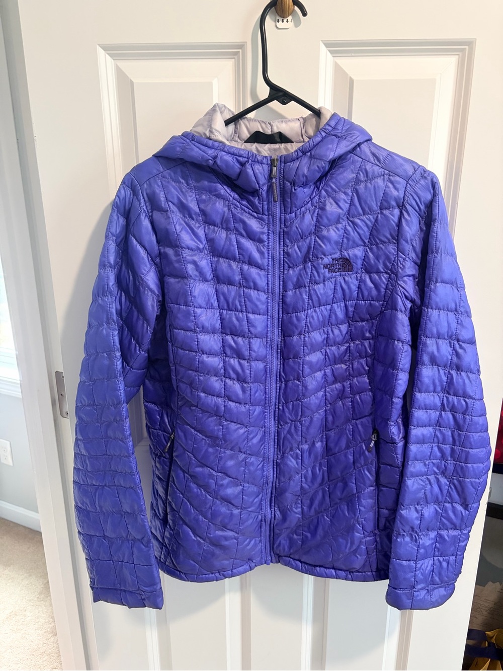 The North Face Women's Hooded Quilted Puffer Jacket in Violet / more bluish